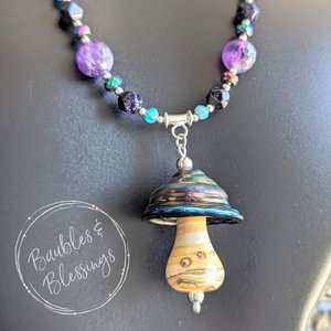 Mushie Spinner Necklace with Galaxy-Inspired Beading