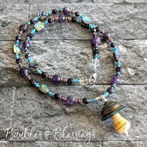 Mushie Spinner Necklace with Galaxy-Inspired Beading