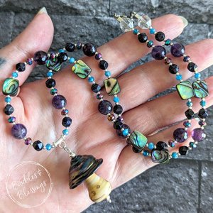 Mushie Spinner Necklace with Galaxy-Inspired Beading