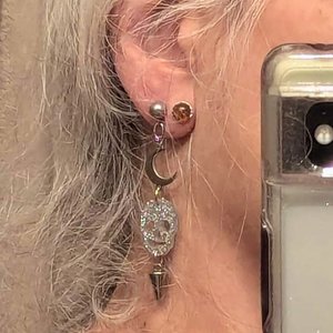 Spiky Glam Crescent Moon Earrings with Holographic Skulls