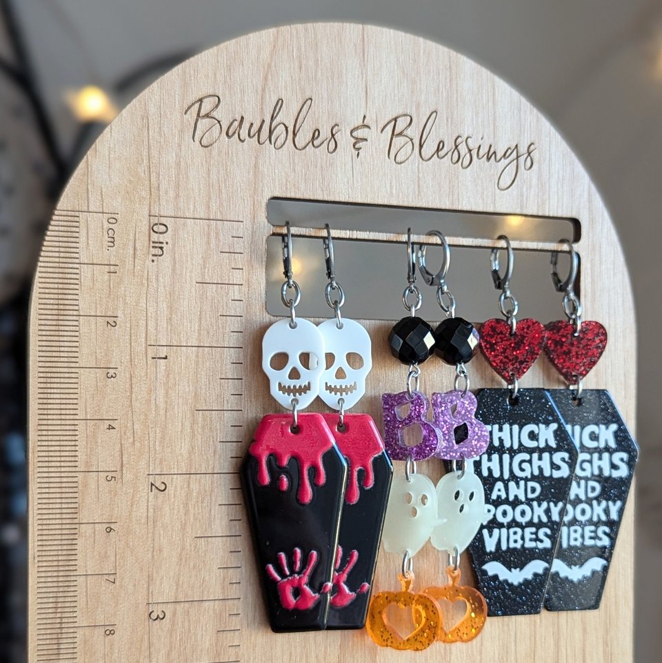 "Thick Things & Spooky Vibes" Earrings with Glitter Coffins