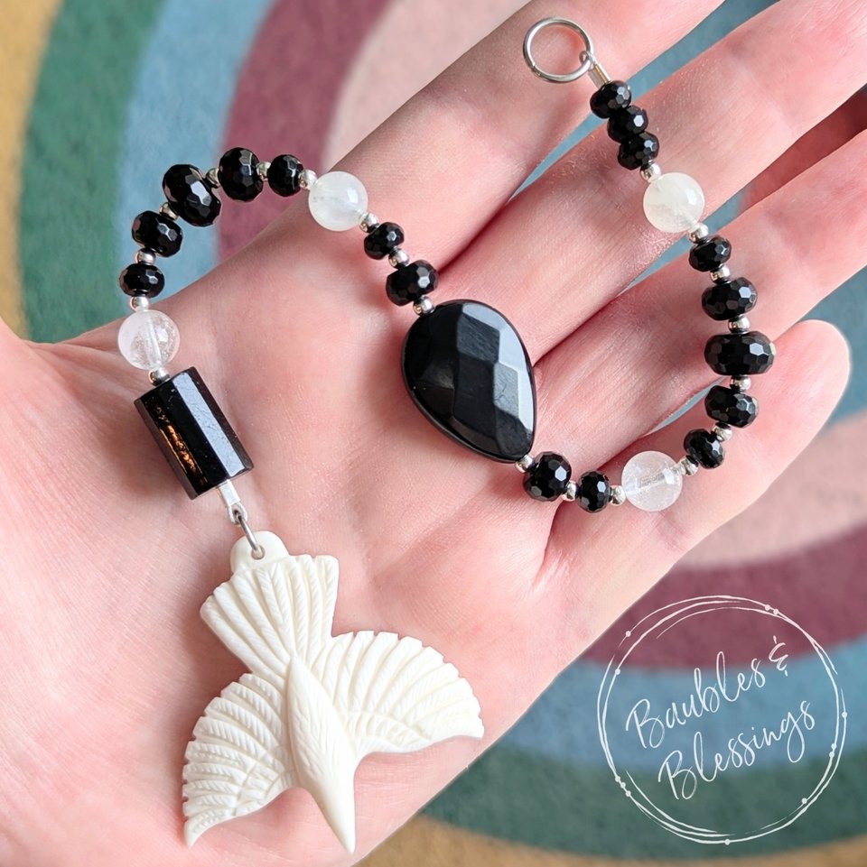 RESERVED for A: White Raven Talisman