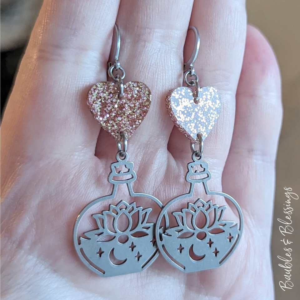 Stainless Steel Potion Bottle Earrings with Sparkly Rose Gold Hearts